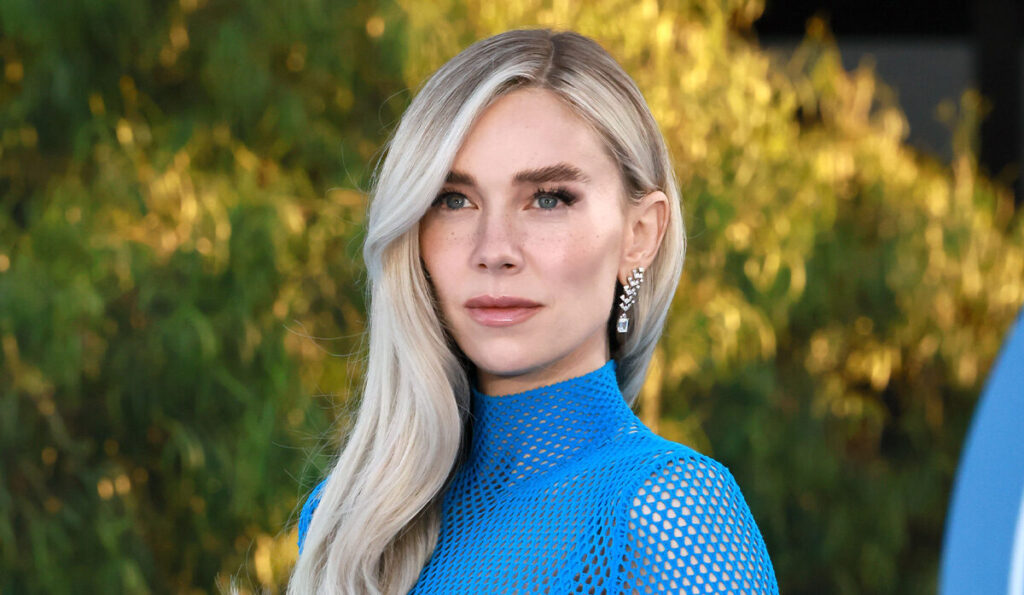 Vanessa Kirby in blue outfit outdoors.