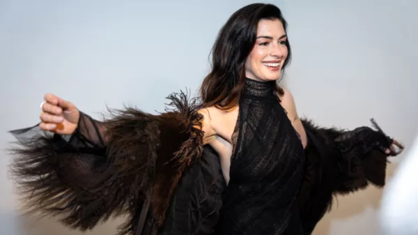 Anne Hathaway serves sheer Ralph Lauren at NYFW in pre-Prada press moment