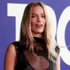 Margot Robbie Steals the Show at Tropfest 2026 in a Sheer Black Gown