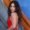 Adria Arjona Stuns in a Plunging Red Gown at the ‘Supergirl ‘Fan Event in London
