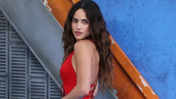 Adria Arjona Stuns in a Plunging Red Gown at the ‘Supergirl ‘Fan Event in London