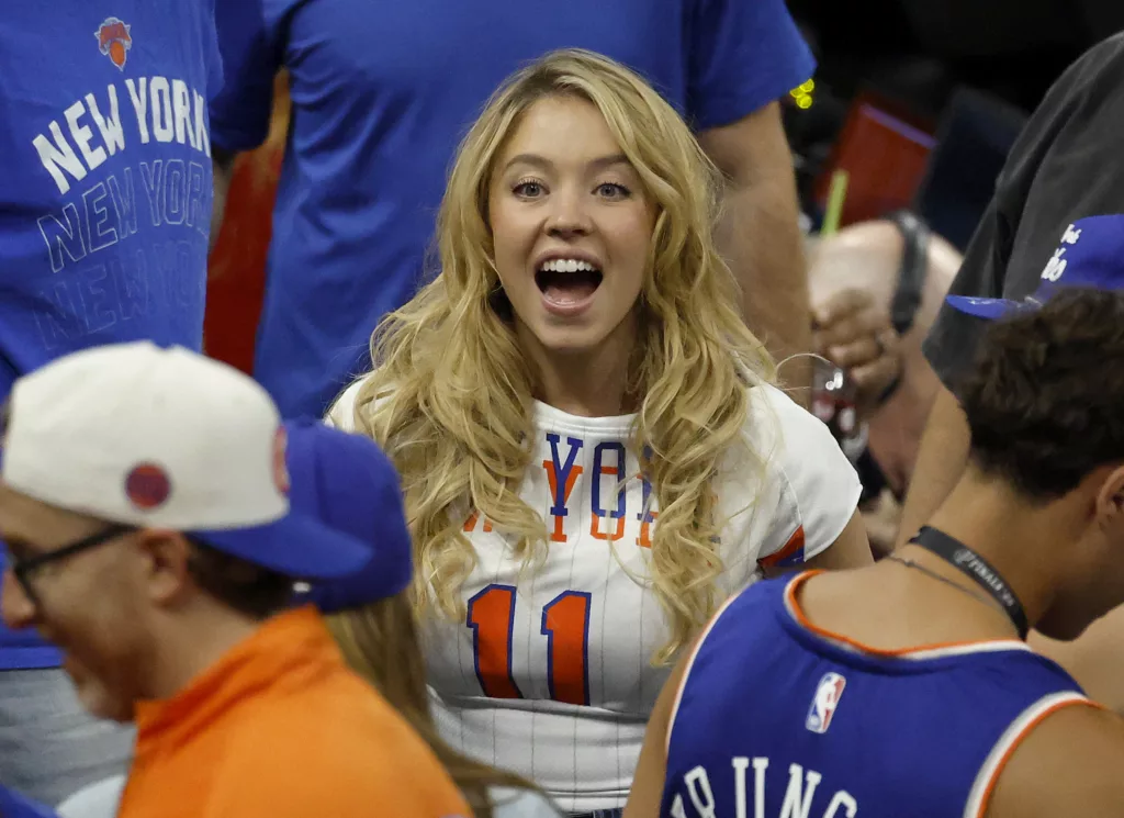 Sydney Sweeney Stuns Courtside in a Custom Brunson Jersey at NBA Finals Game 5x - Jason Szenes for the New York Post