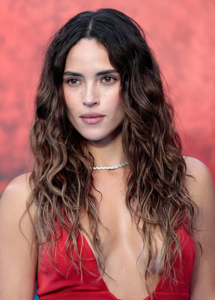 Adria Arjona Stuns in a Plunging Red Gown at the Supergirl Fan Event in London - Getty Images
