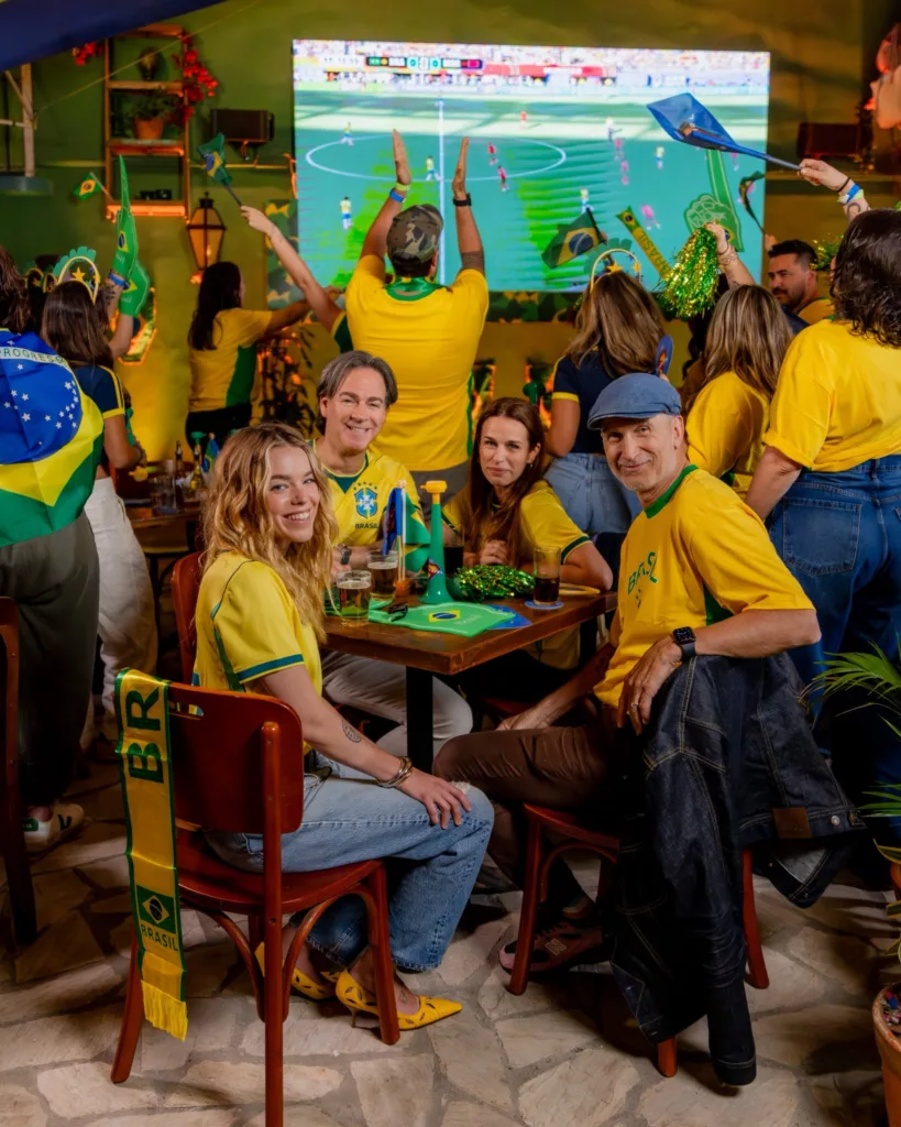 Milly Alcock Goes Full Brazil in a Yellow Jersey at a World Cup Watch Party - Warner Bros. Pictures / DC Studios