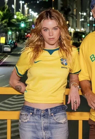 Milly Alcock Goes Full Brazil in a Yellow Jersey at a World Cup Watch Party - Warner Bros. Pictures / DC Studios