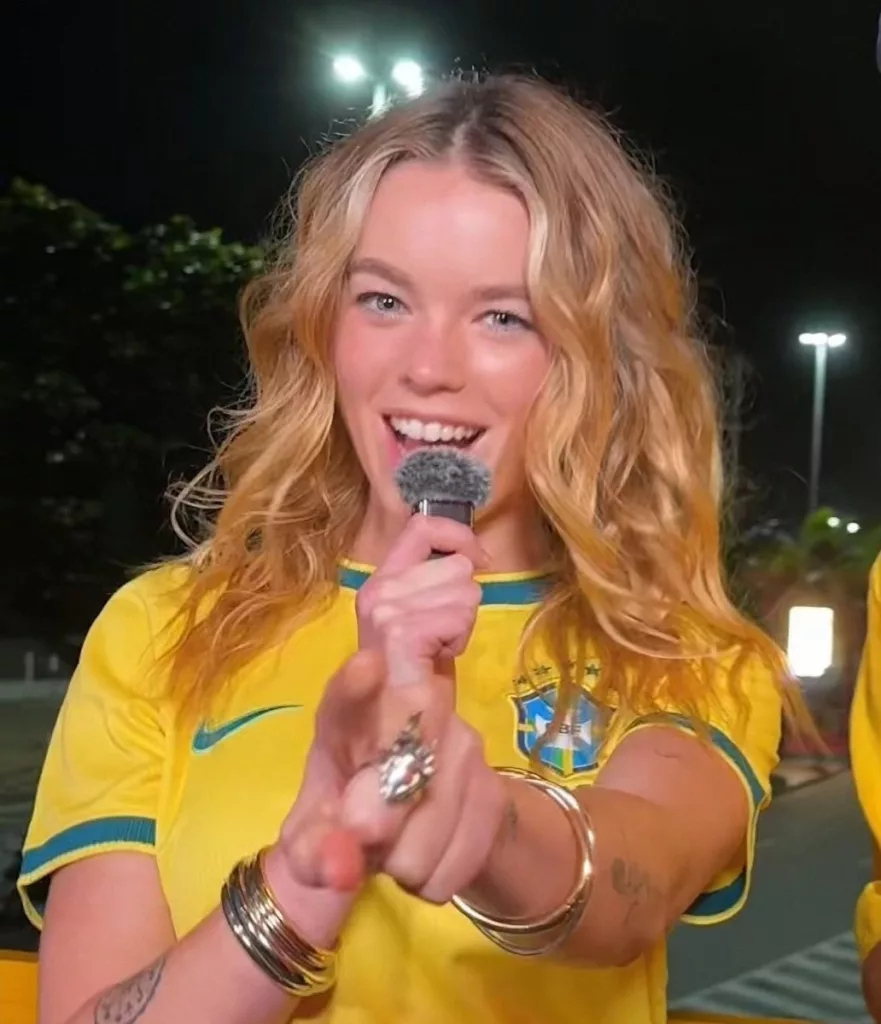Milly Alcock Goes Full Brazil in a Yellow Jersey at a World Cup Watch Party - Warner Bros. Pictures / DC Studios